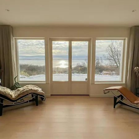 Swedish Timber House Overlooking Arreso *