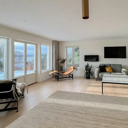 Swedish Timber House Overlooking Arreso *